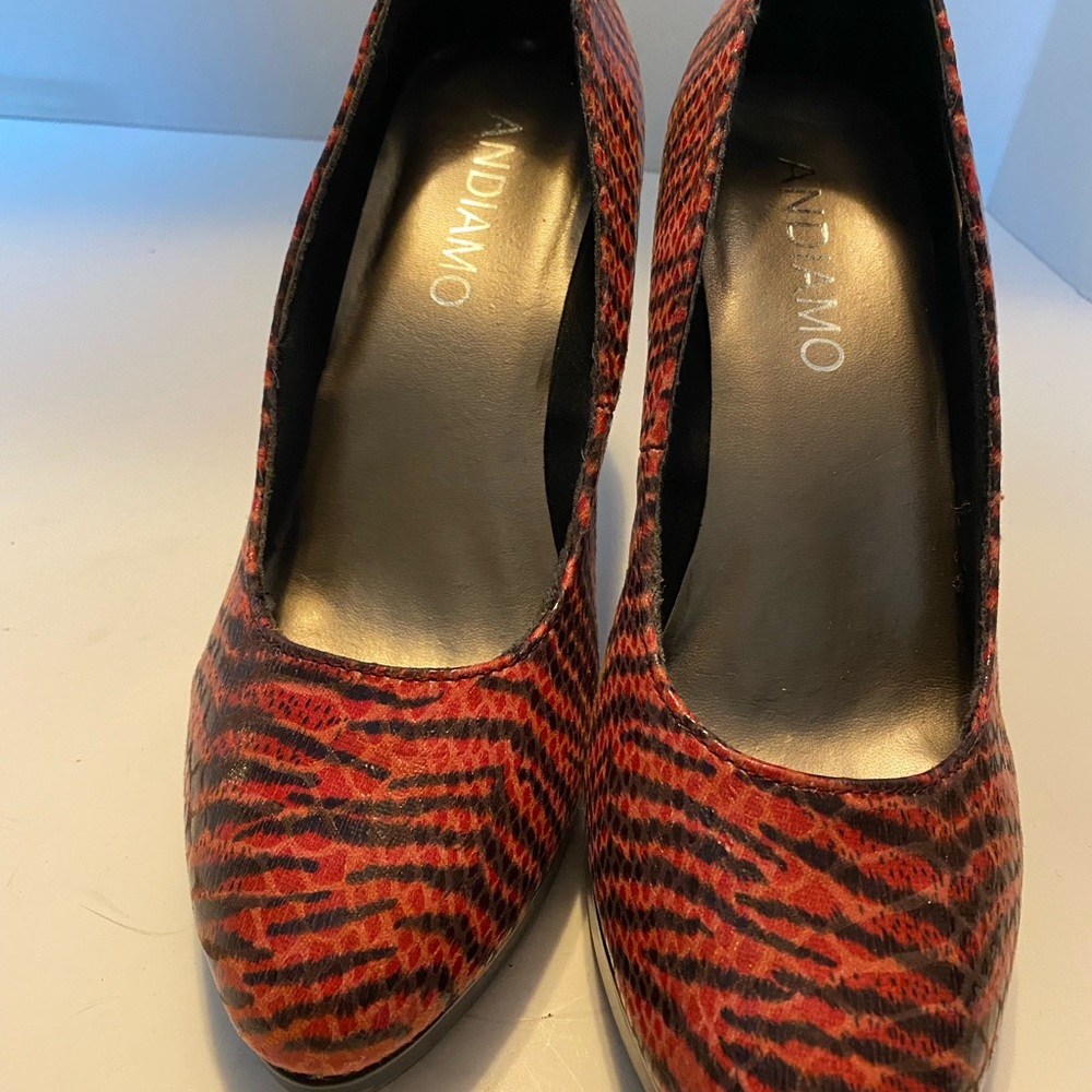 Andiamo red and black snake skin design pumps.  Size 8